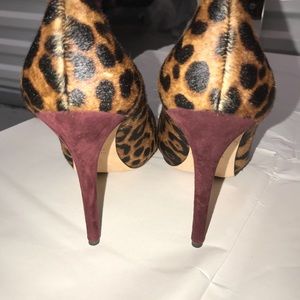 Alexander McQueen leopard print pumps.